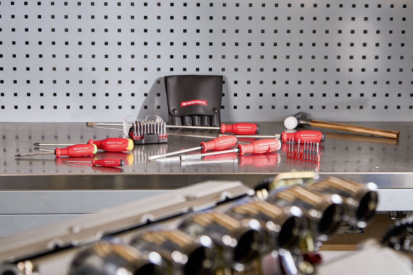 Professional service tools arranged on a workbench